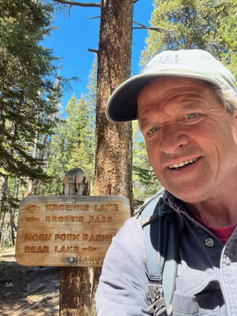 Homes & Land for Sale in Buena Vista CO, Salida, Chaffee, Lake & Park County - Realtor in Buena Vista CO - Daniel Roberts standing in front of trail sign